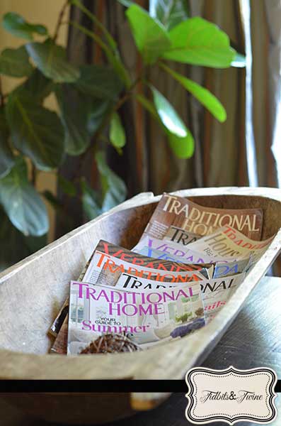 My new dough bowl purchased at the Alameda Pointe Antique Faire! I haven't yet decided what to do with it, so for now, it's holding magazines.