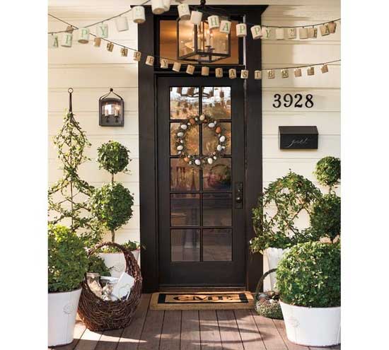 Front porch with topiaries