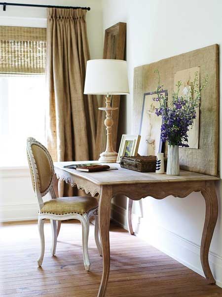 french writing desk with bulletin board leaning on top purple flowers and lamp