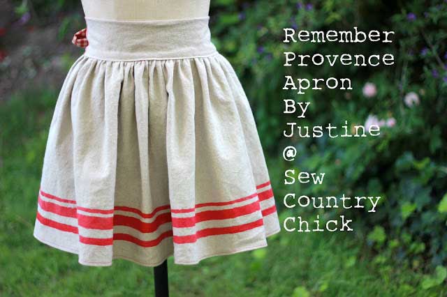 DIY grain sack apron with red stripes on a dress form 