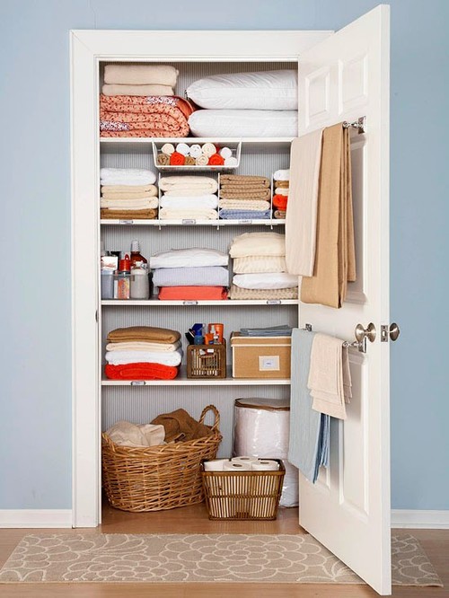 Ticking wallpaper linen closet