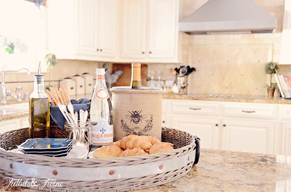 Farmhouse kitchen white cabinets, travertine and granite.
