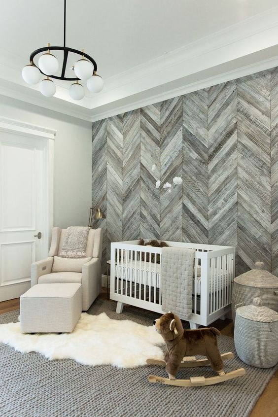 DIY herringbone planked wall in baby nursery