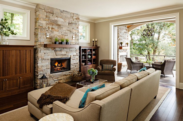 {An amazing outdoor setting is highlighted with glass pocket doors. Image via Modern Homes}