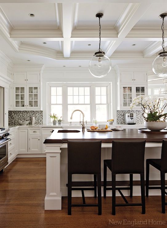 {A tall ceiling allows for extra architectural detail and dimension. Source}