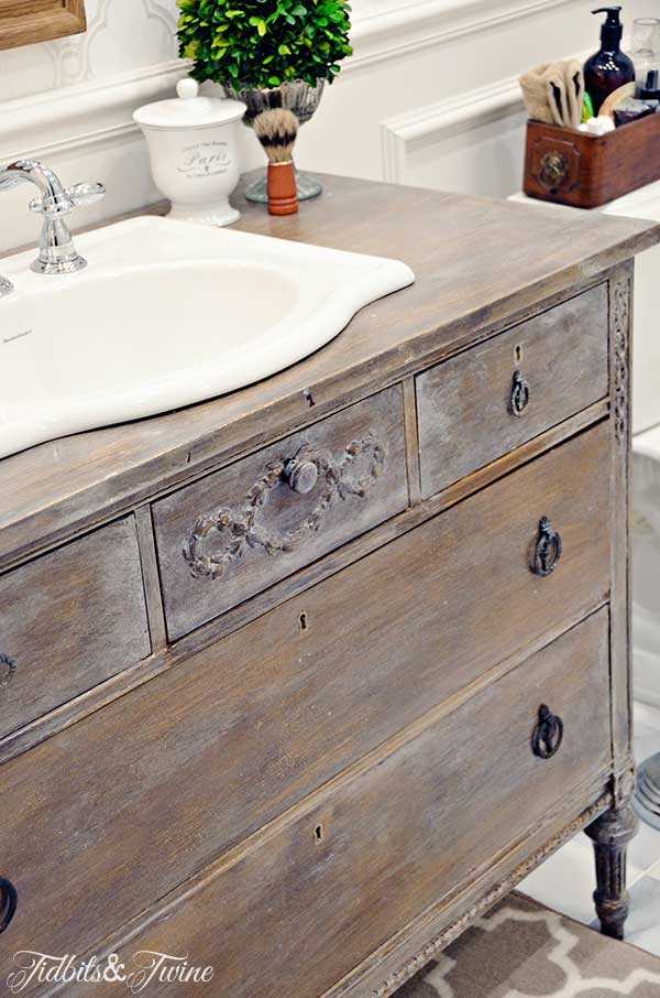 TIDBITS&TWINE Guest Bathroom Remodel - A vintage dresser converted into a vanity