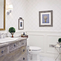 bathroom makeover with dresser vanity trellis wallpaper beadboard ceiling and carrara marble