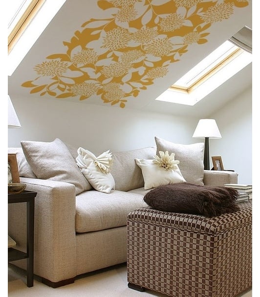 Cozy attic lounge with painted ceiling