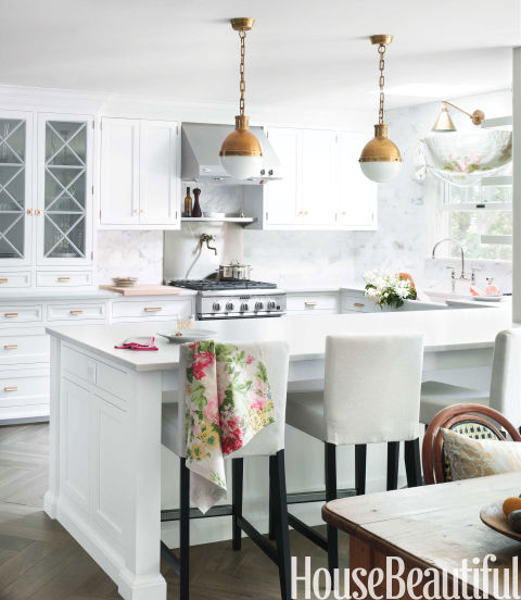 White Kitchen with brass pendants