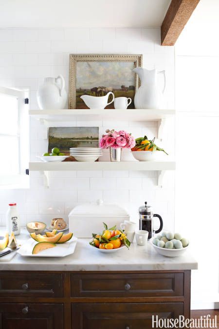 White Kitchen with open shelving and rustic beams