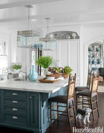 White kitchen with blue island