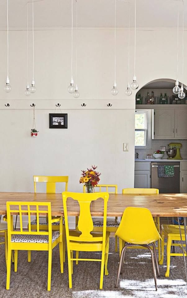 Electic Yellow Dining Chairs around a hairpin leg table contemporary dining room