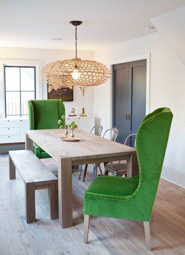 Wingback Green Head Chairs in a contemporary dining room with bench seating