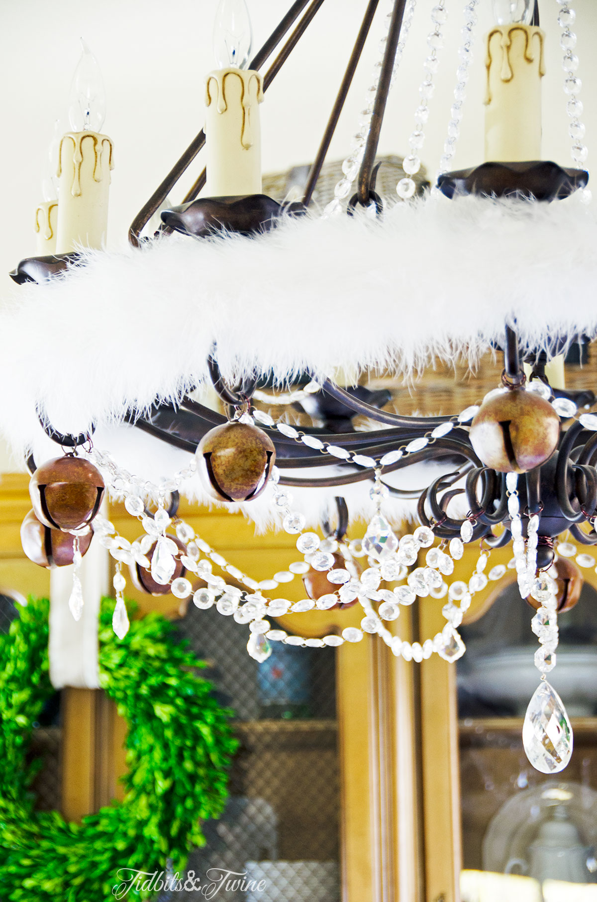 chandelier with crystal decorated for christmas with bells and white fur