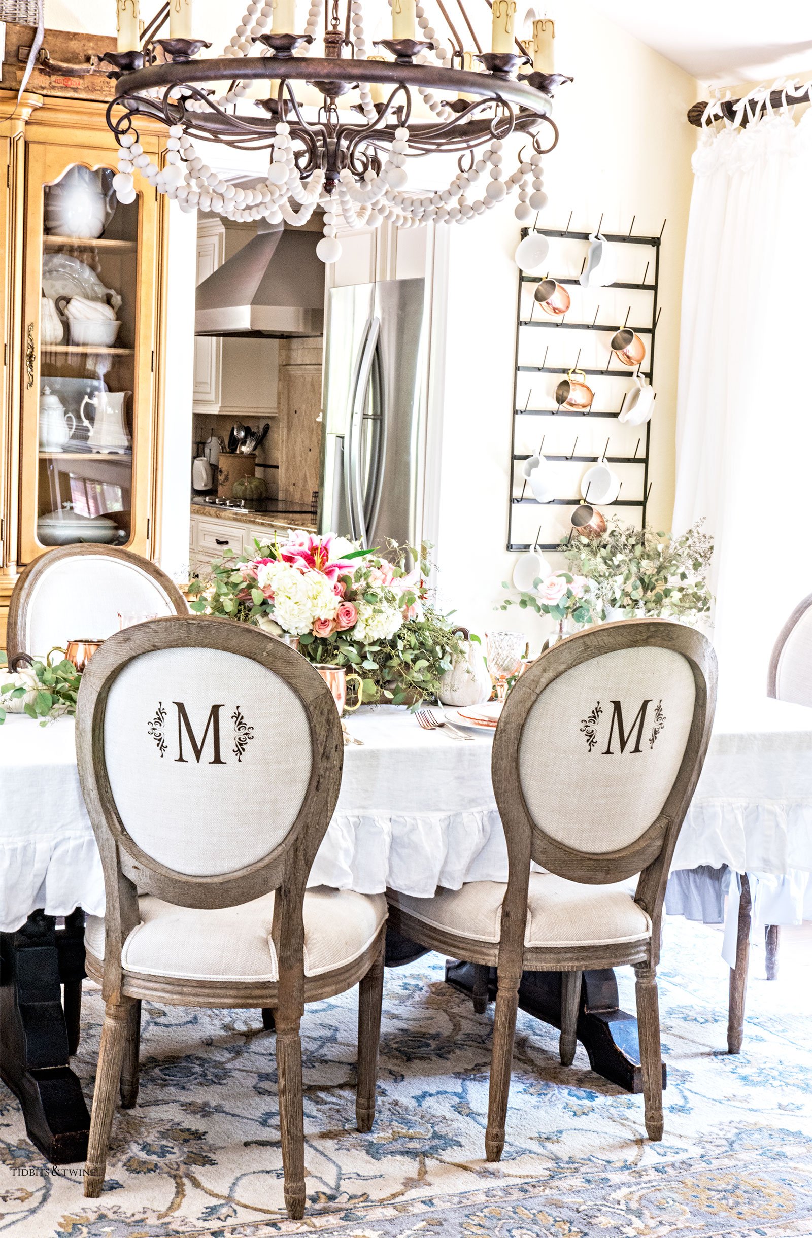 Fall french dining room with beaded chandelier from Tidbits&Twine