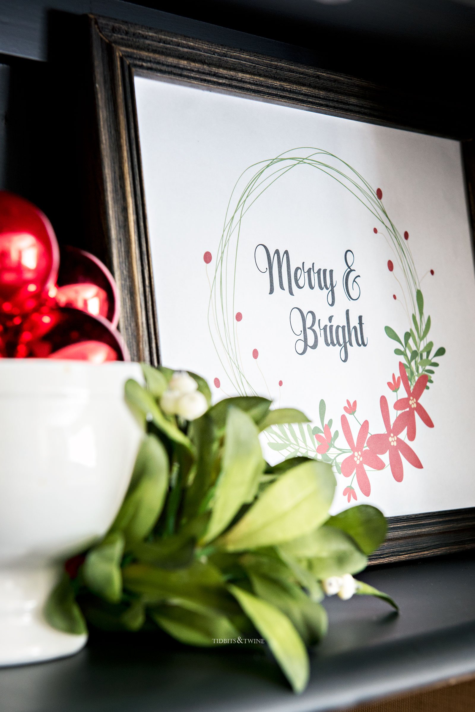 Free Christmas printable frame and displayed on a shelf