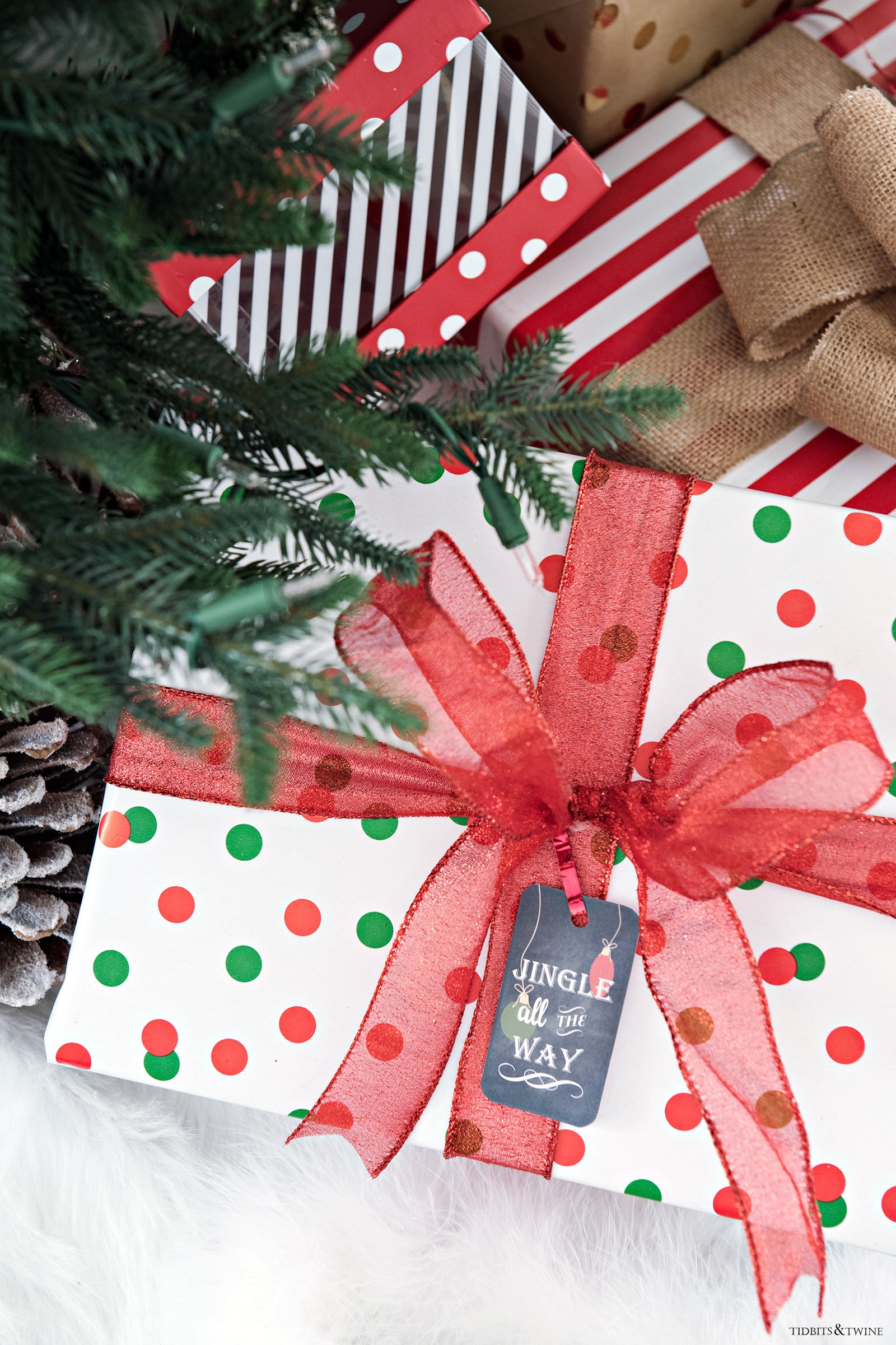 Red and white wrapped Christmas packages with FREE downloadable Christmas tags