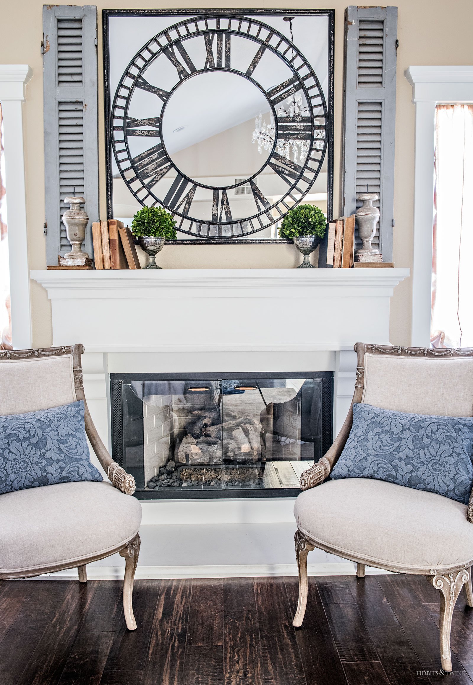 TIDBITS&TWINE Master Bedroom Mantel with French chairs