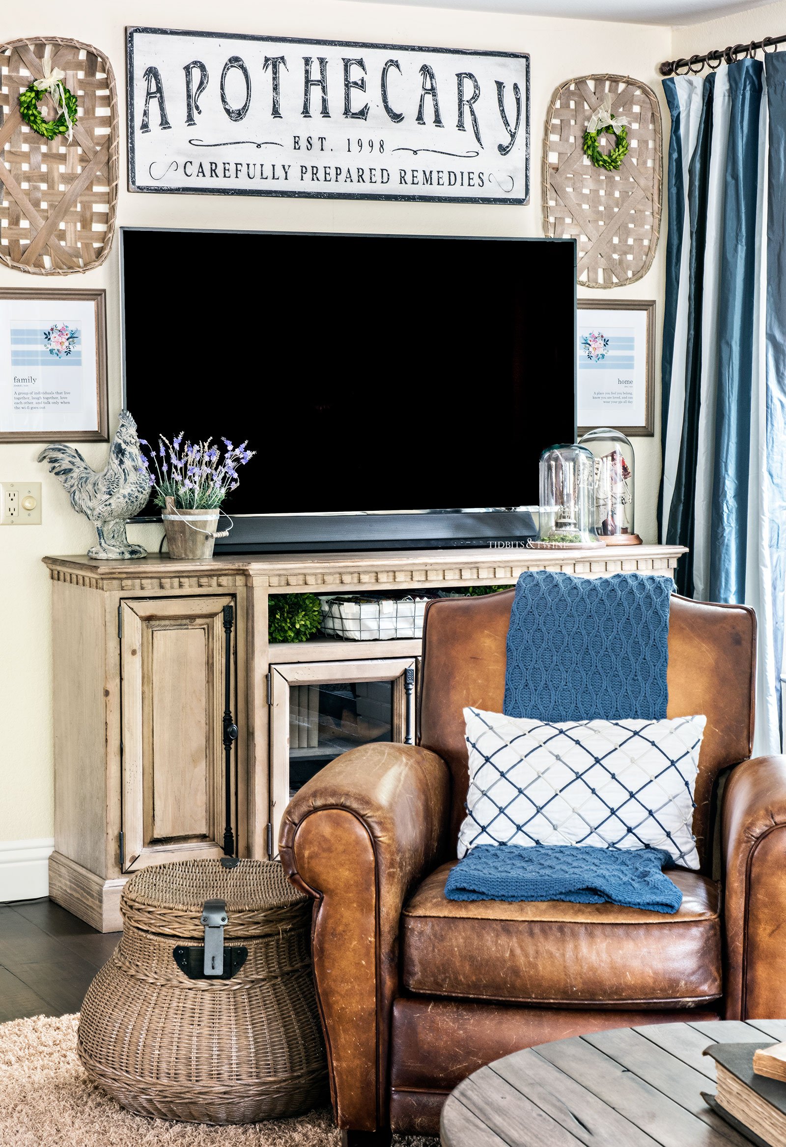 French Farmhouse Gallery Wall around a TV with leather recliner