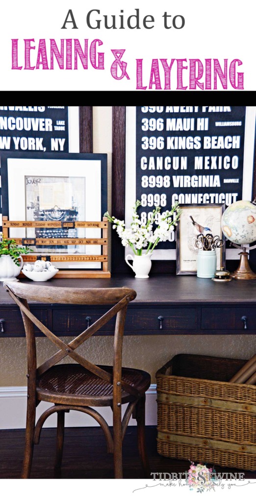 French style desk with artwork leaned against wall