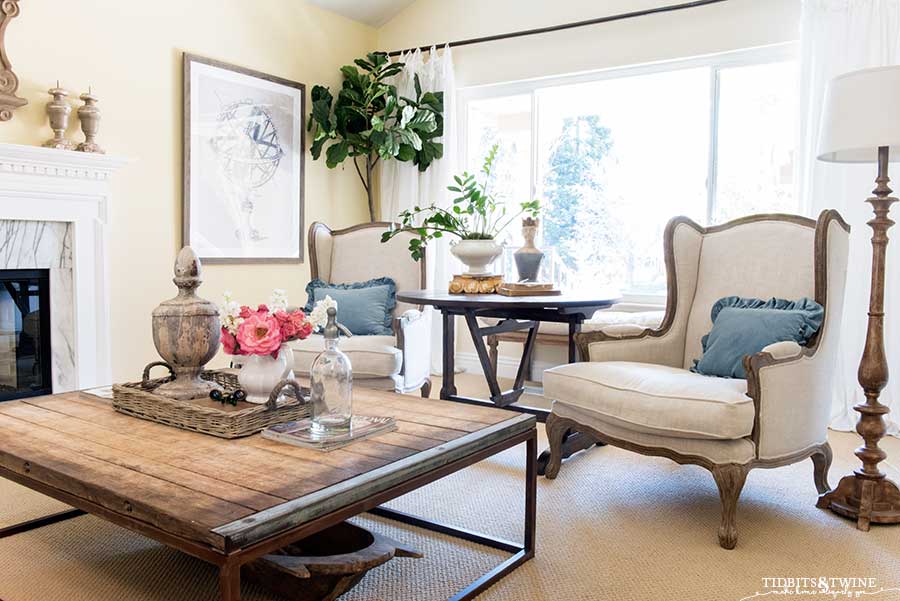 French wingback chairs and industrial coffee table