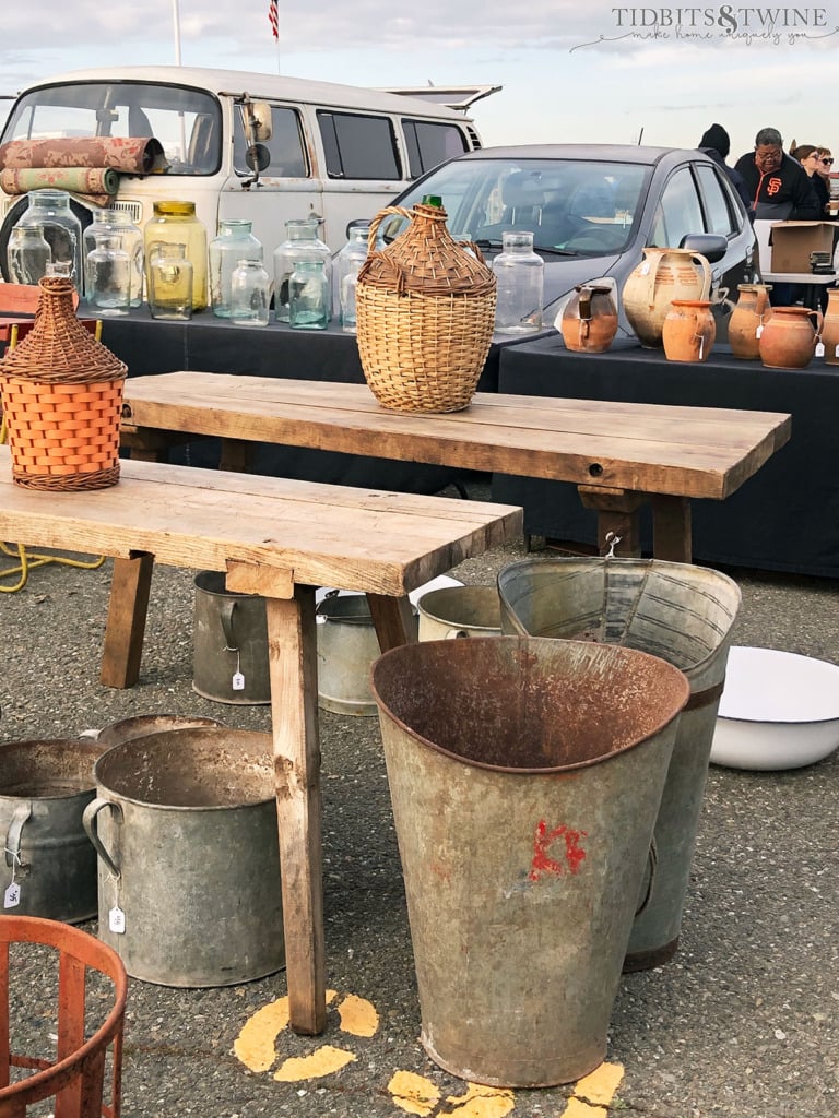 Vintage European demijohns and harvest buckets