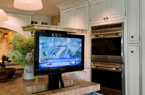 TV on lift in kitchen counter