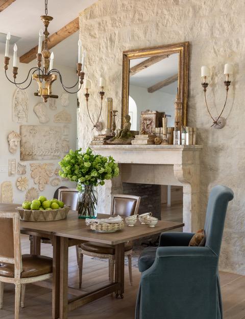 Brooke Giannetti French country Dining Room and Fireplace flanked by sconces