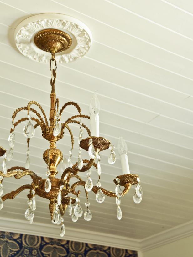 Gold and crystal ceiling chandelier with medallion