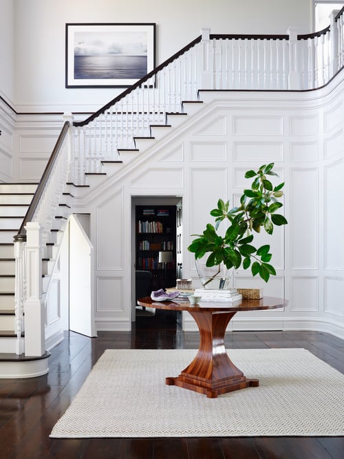 White Moldings on wall and going up Stairway