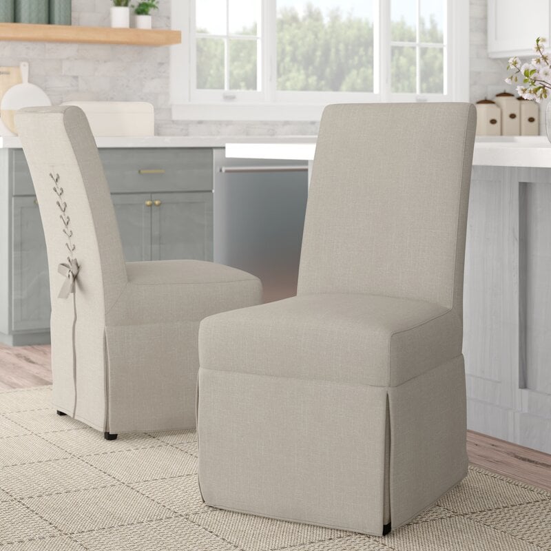 Beige slipcovered parsons chair with laceup back from Birch Lane