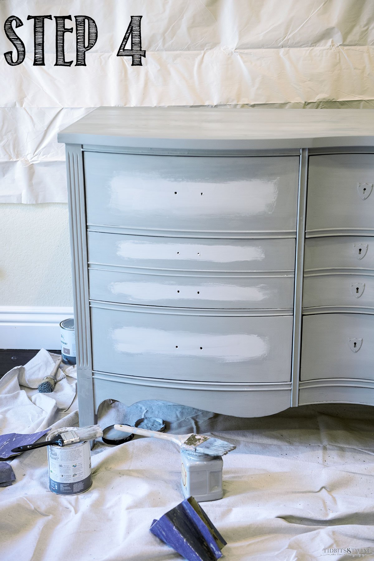 Antique dresser with manatee gray and chicago grey in the center of drawers