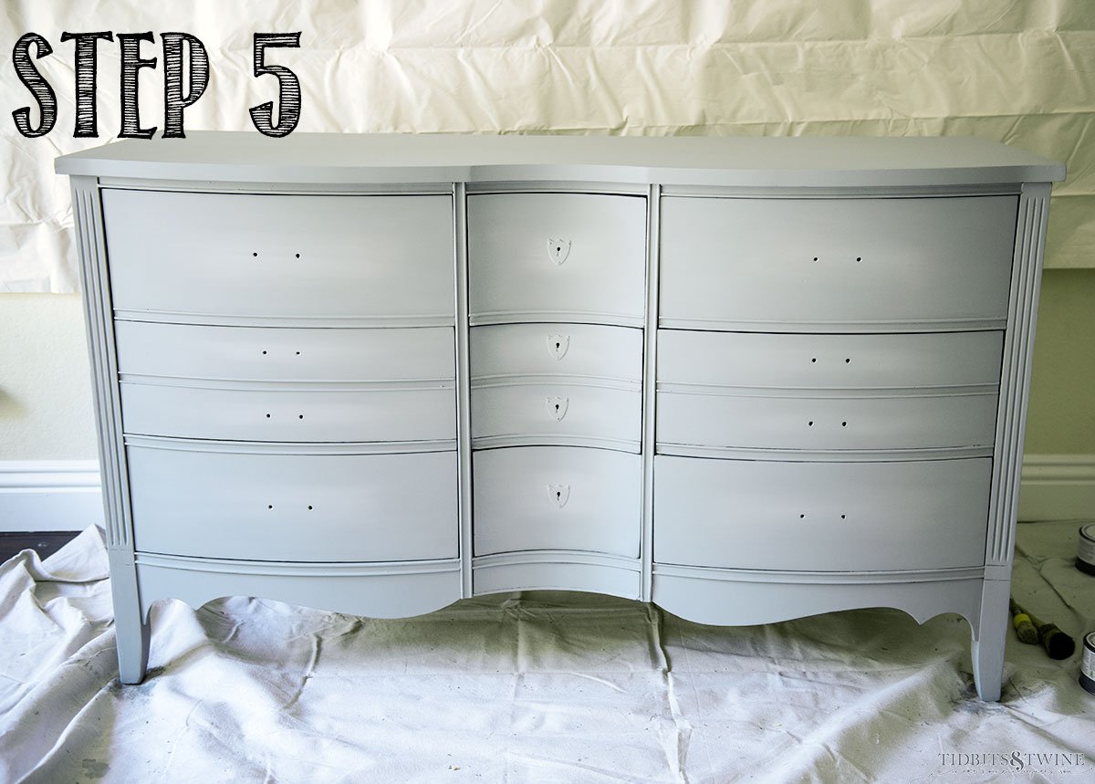 Gray blue chalk paint blended on drawers of antique dresser