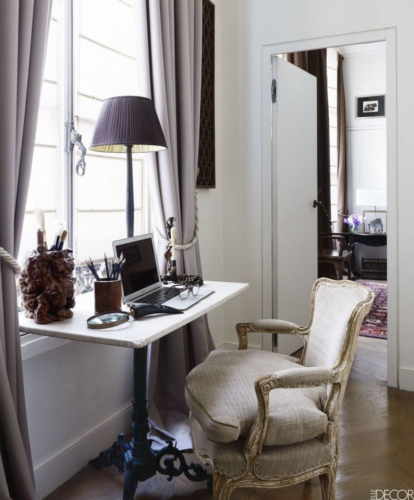 beautiful French parisian home office with table underneath a window and french style chair