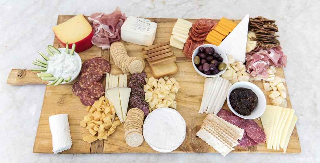 DIY charcuterie boards with dips meats cheeses and crackers
