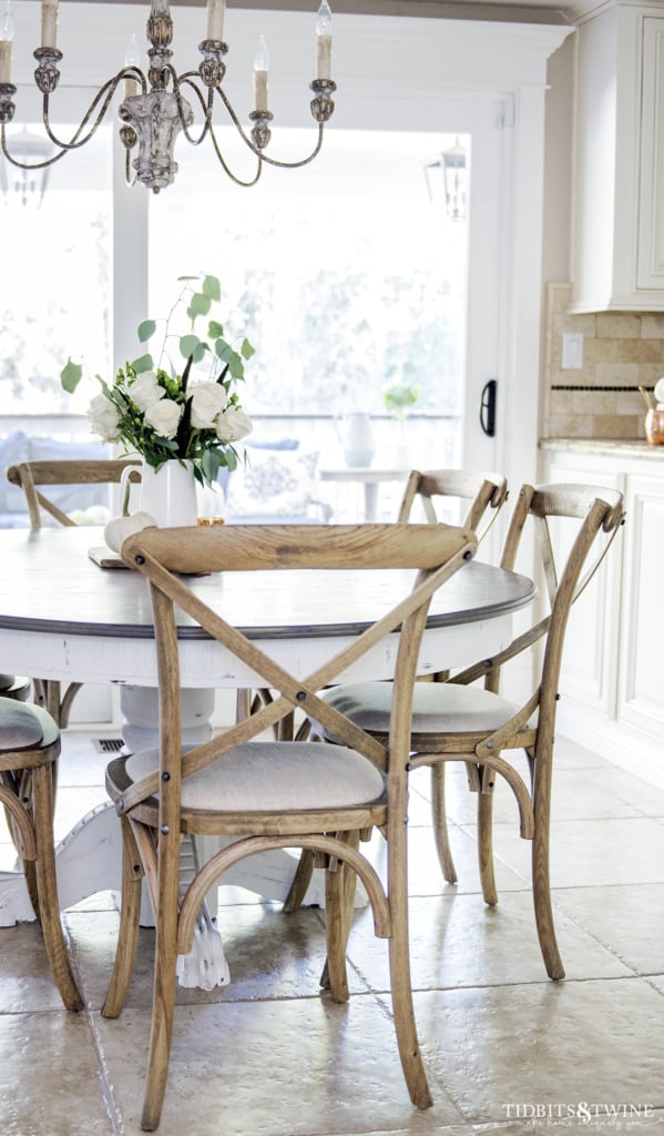 French farmhouse kitchen table and chairs with French chandelier