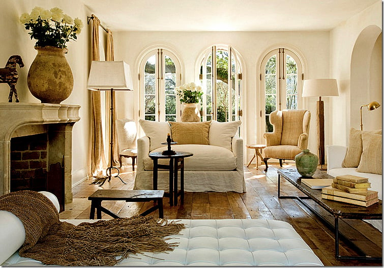 European style neutral living room with wood floors and linen furnishings