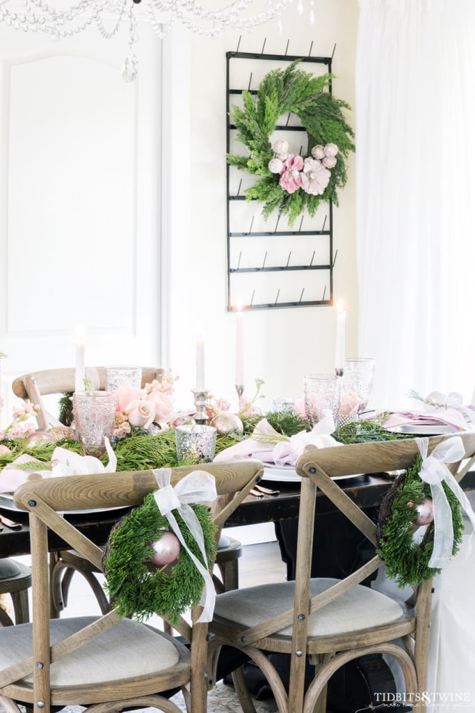 Pink green and silver Christmas tablescape idea in dining room