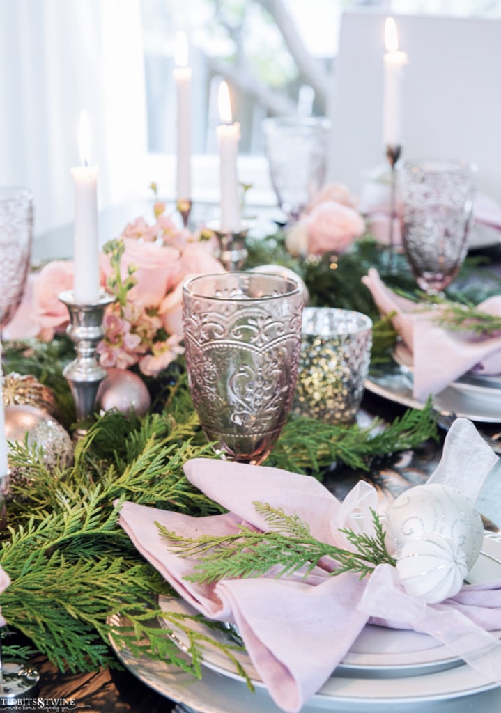 Christmas place setting with pink and silver and white and garland