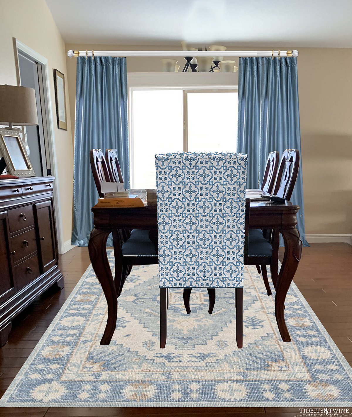 Traditional and contemporary dining room dark queen anne dining table blue silk curtains blue contemporary rug and chair