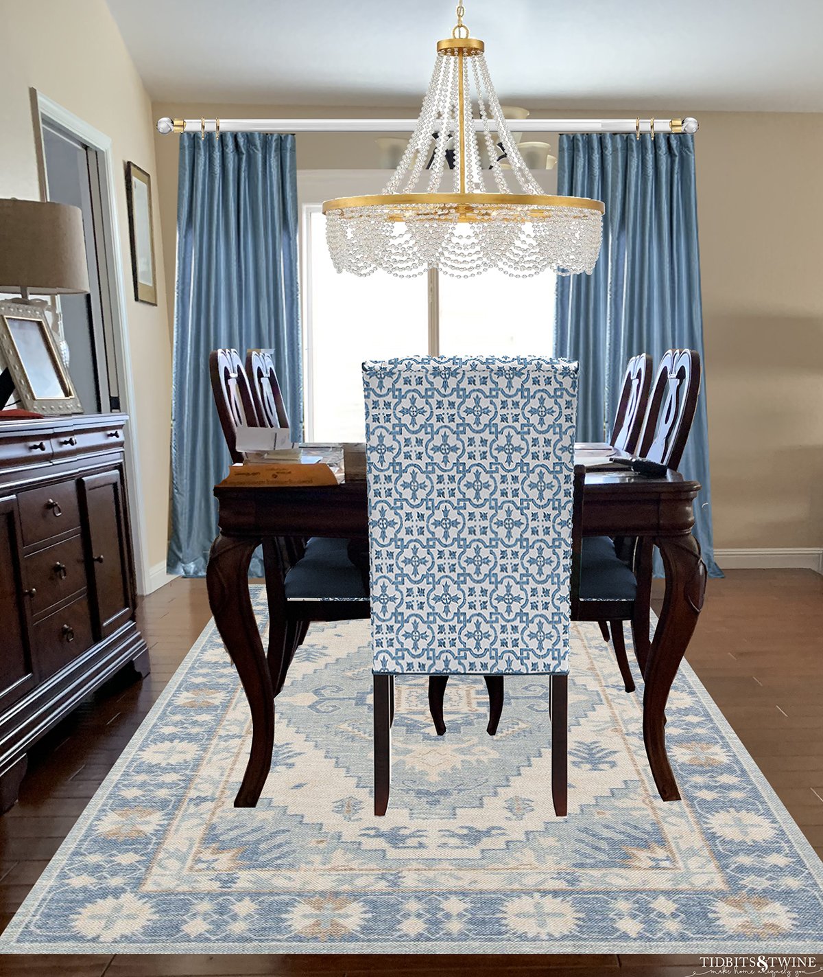 Traditional and contemporary dining room traditional table blue silk curtains blue contemporary rug and chair and chandelier