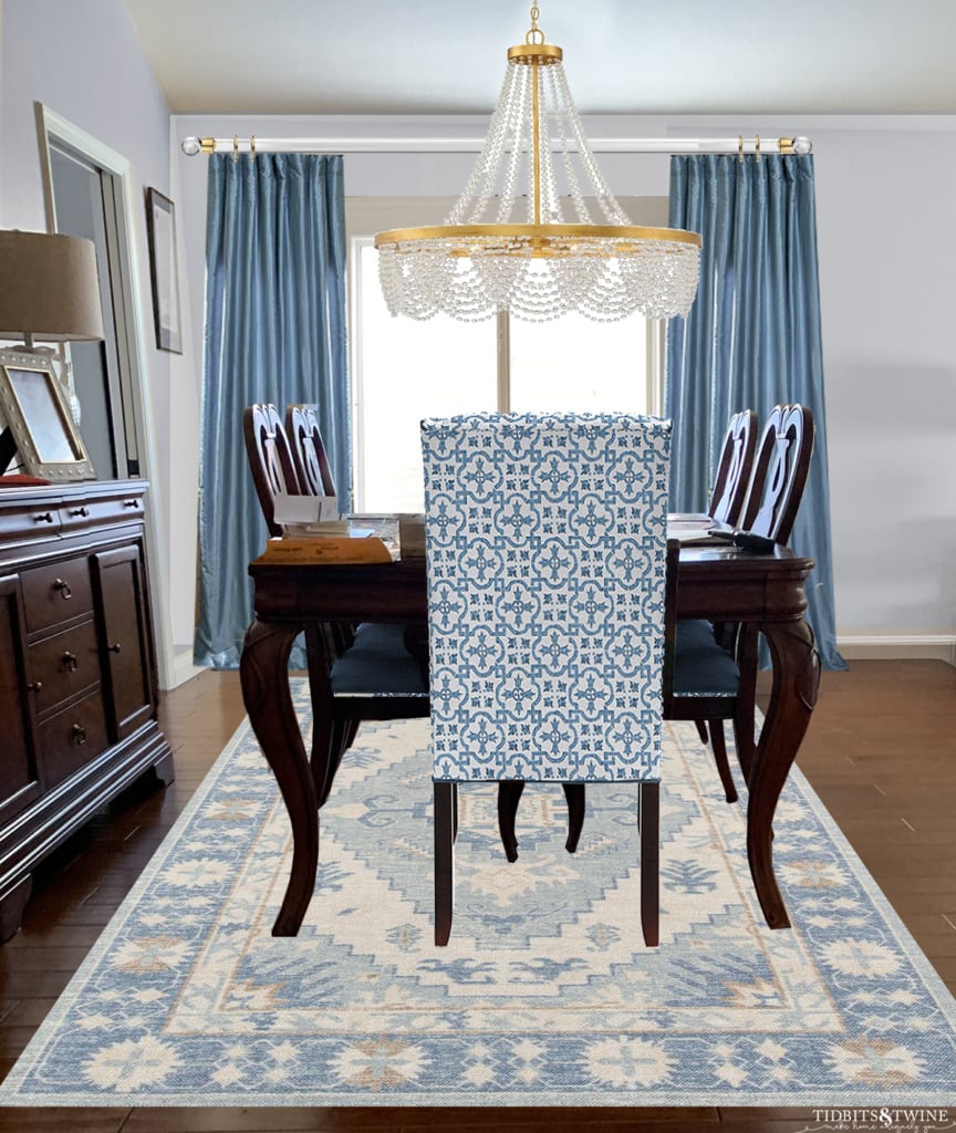 Traditional and contemporary dining room traditional table blue silk curtains blue contemporary rug and chair and chandelier