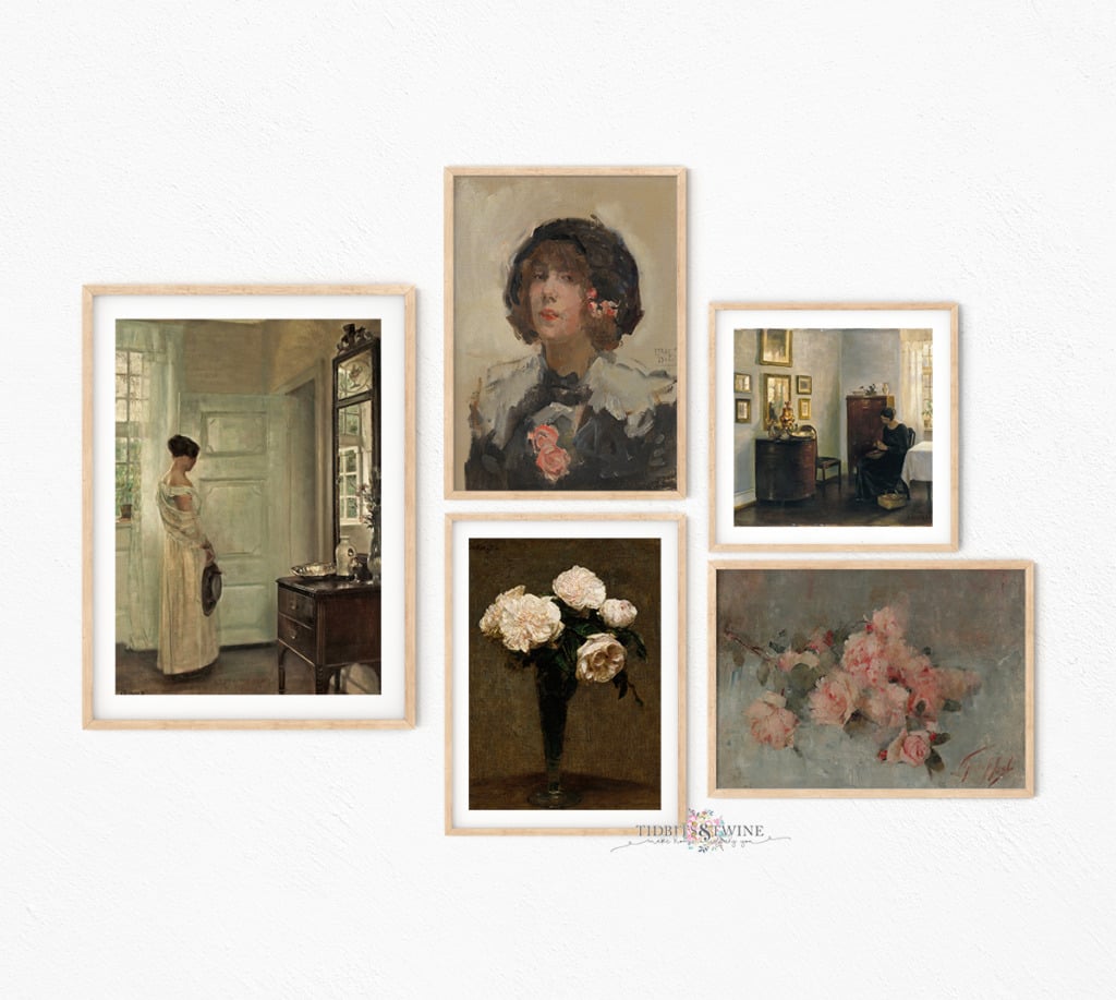 A gallery wall of framed Carl Holsoe art and flower art on a white wall