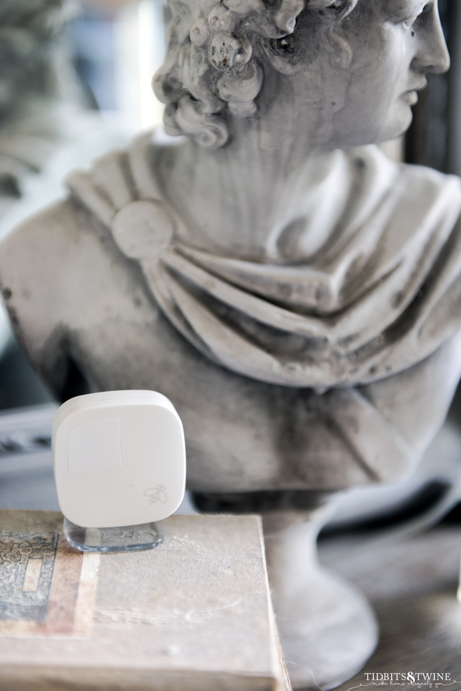 small ecobee thermostat sensor sitting on a nightstand