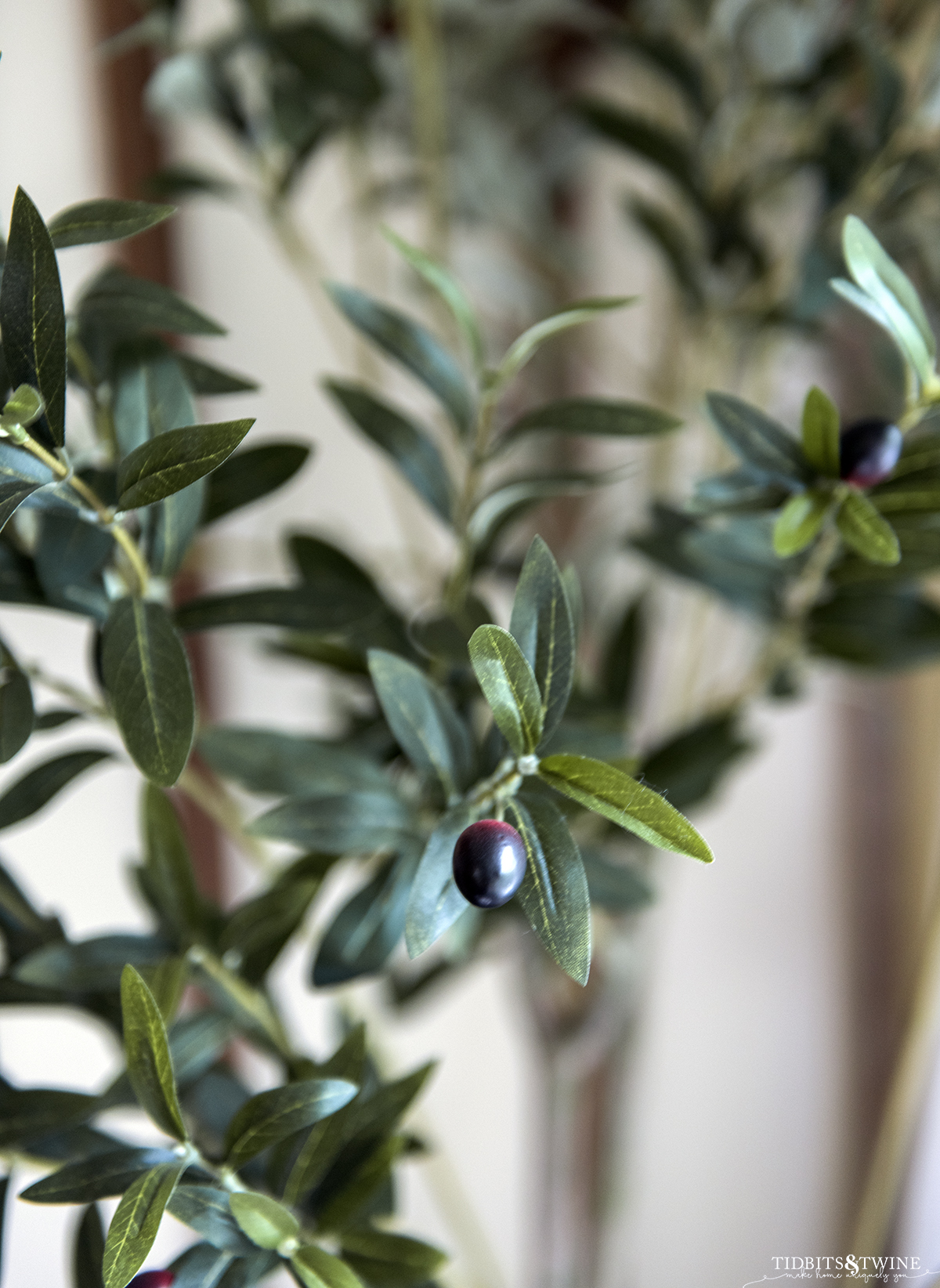 closeup of fake olive tree leaves showing how realistic they look