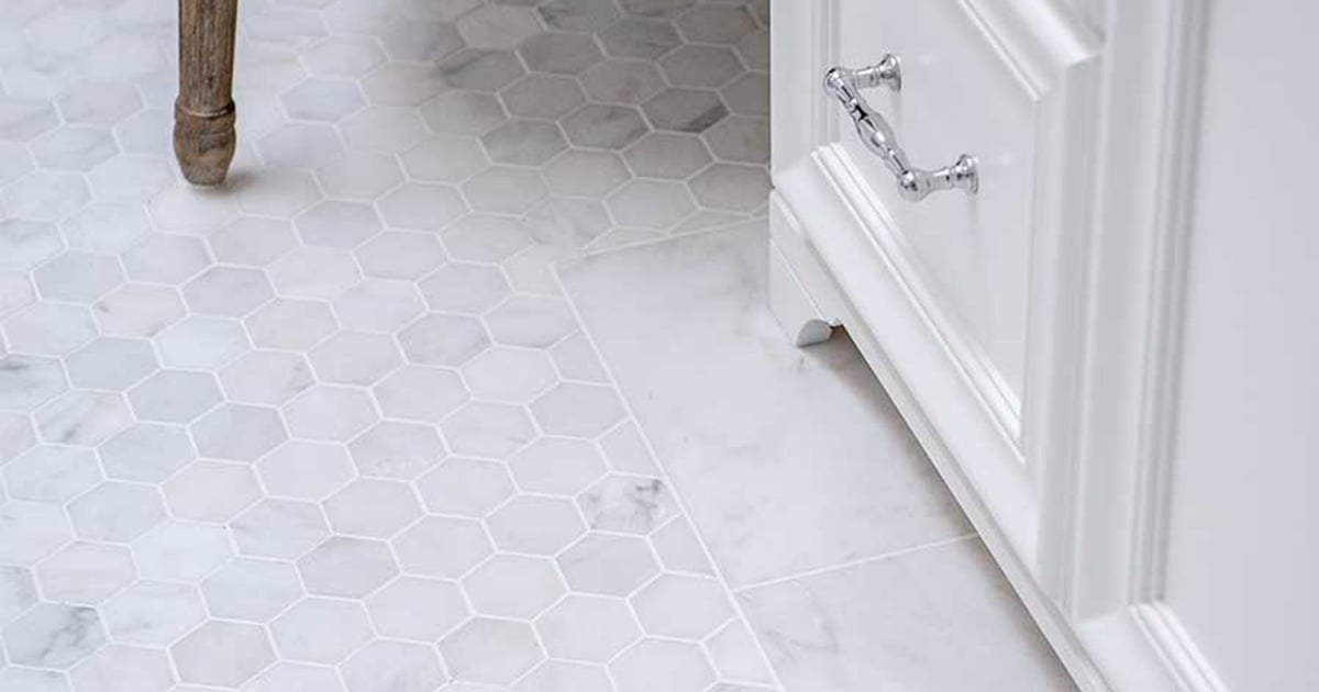 bathroom with 2" white hexagon marble floor with subway border and white vanity