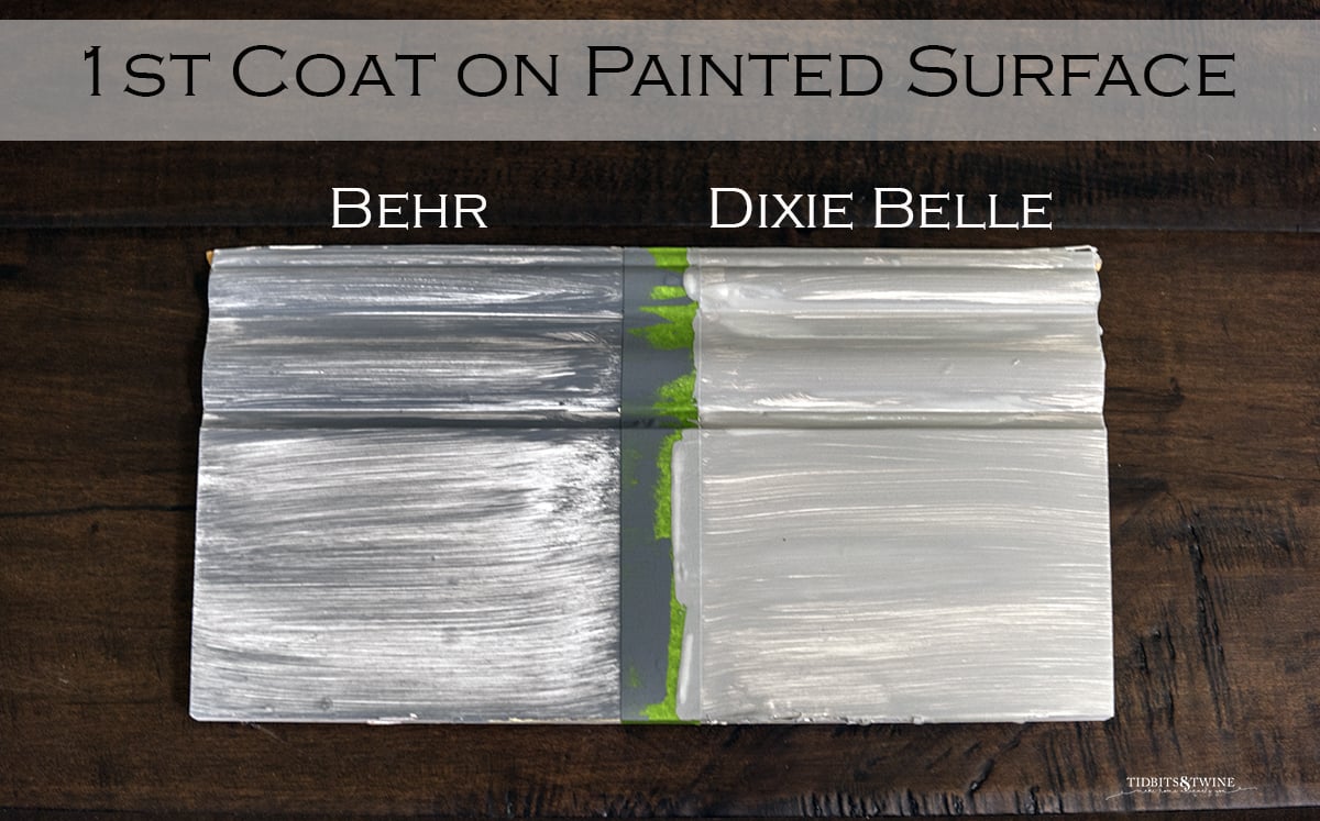 board sectioned in two one painted with behr chalk paint and one dixie belle showing coverage on 1st coat of paint