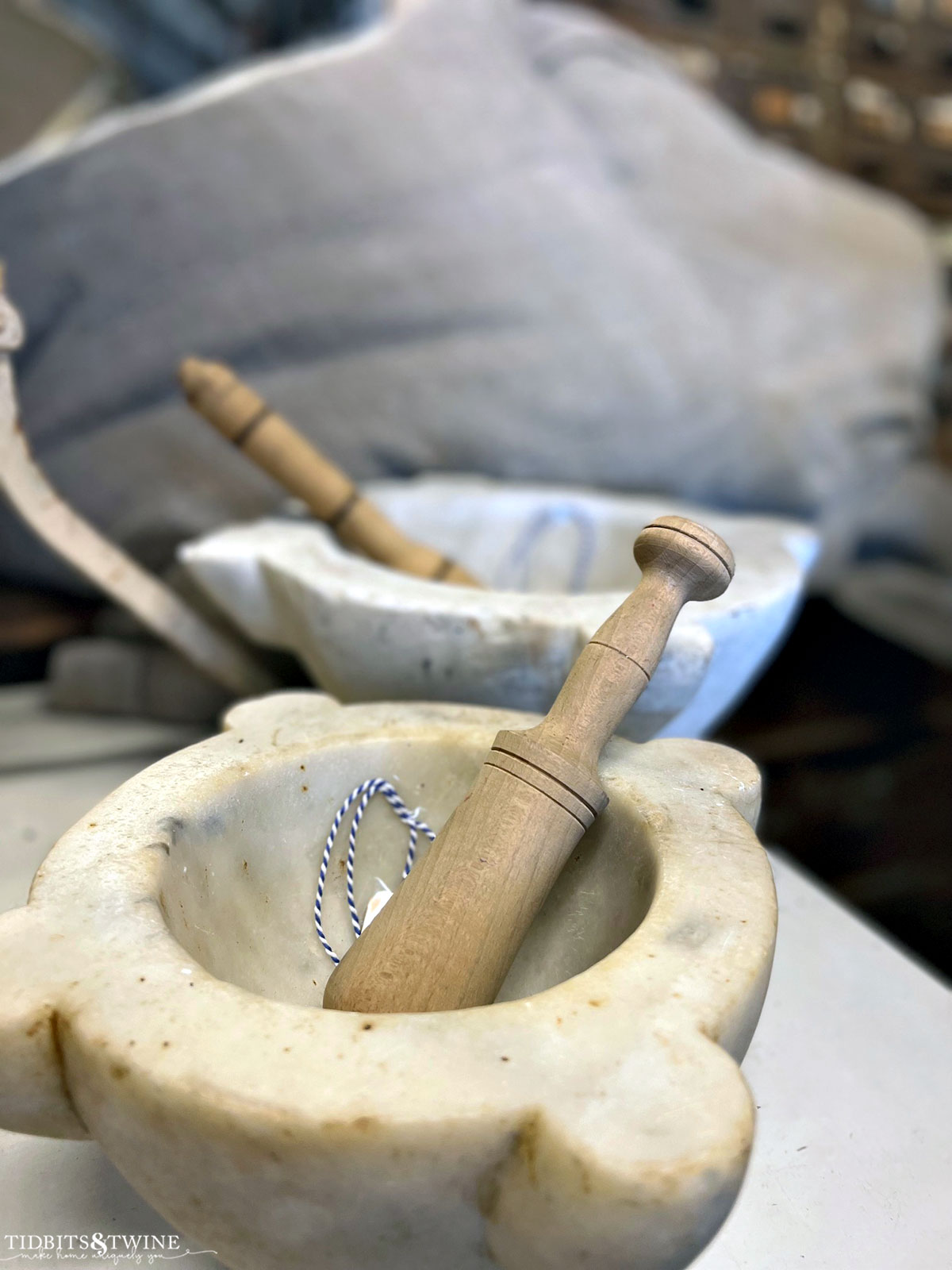 antique marble pestle and mortar on a table