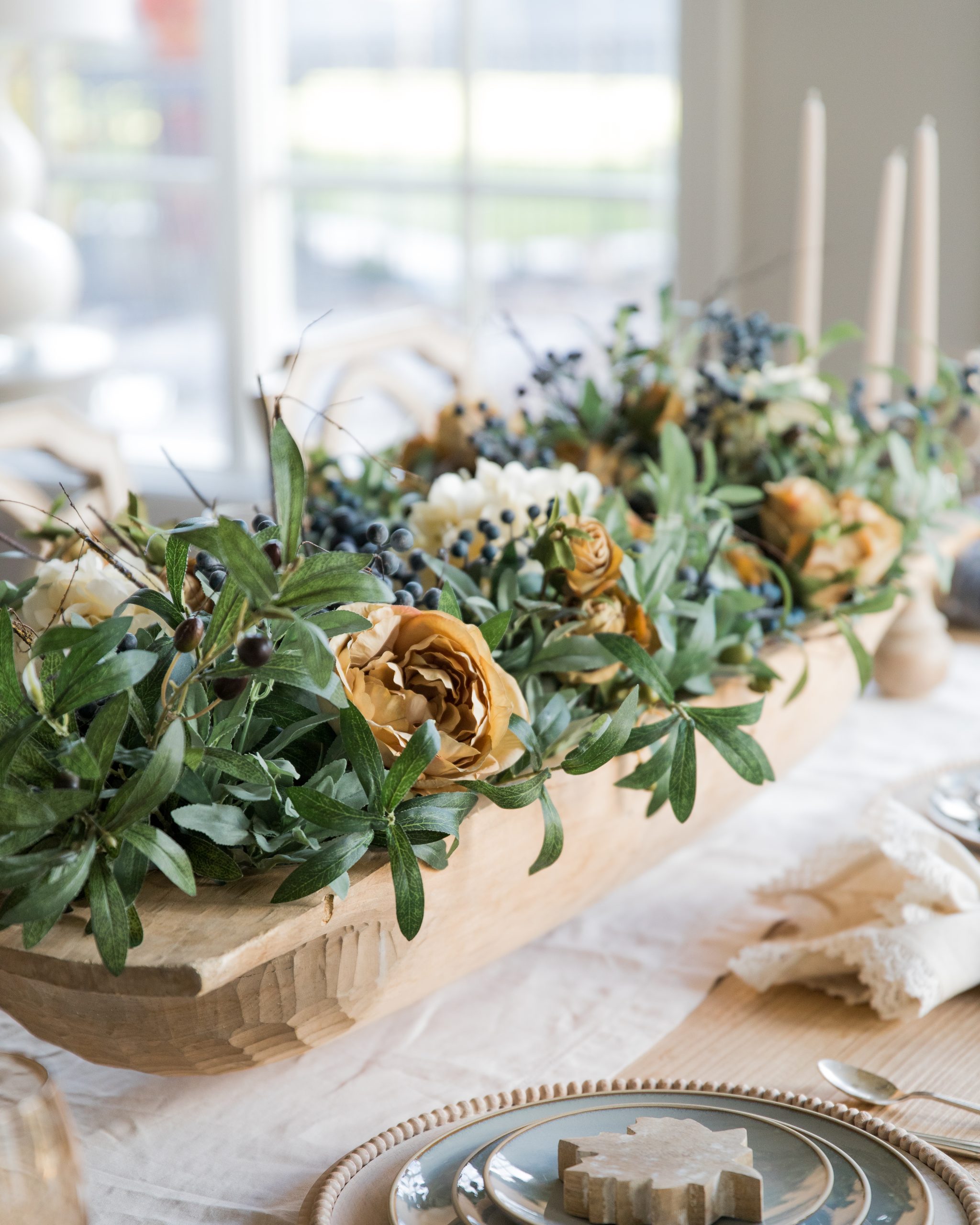 Kitchen Island with Metal Tray of Flowers, Containers and Bowls