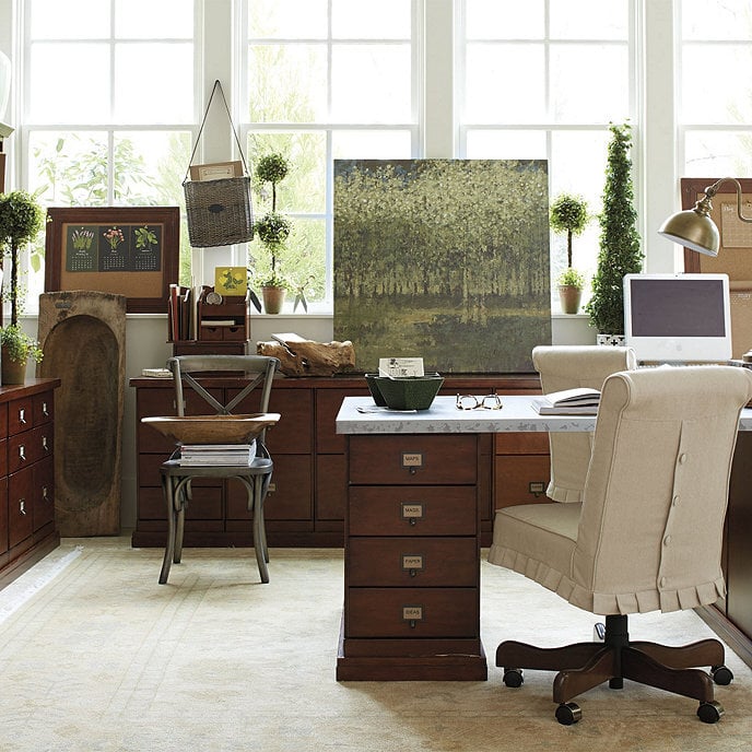 home office with brown traditional furniture and antique decor including dough bowls throughout